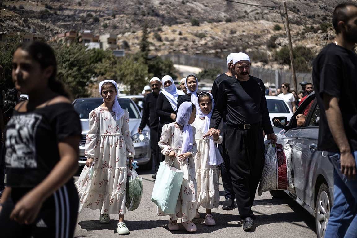 একটি দ্রুজ পরিবার ইসরায়েল থেকে সিরিয়ায় ফিরছে।